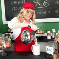 60+blonde Dawn Jilling unveils her titties while serving up coffee
