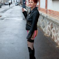 Sixty plus ginger-haired lady Caroline Hamsel entices a couple of guys on the street in slutwear